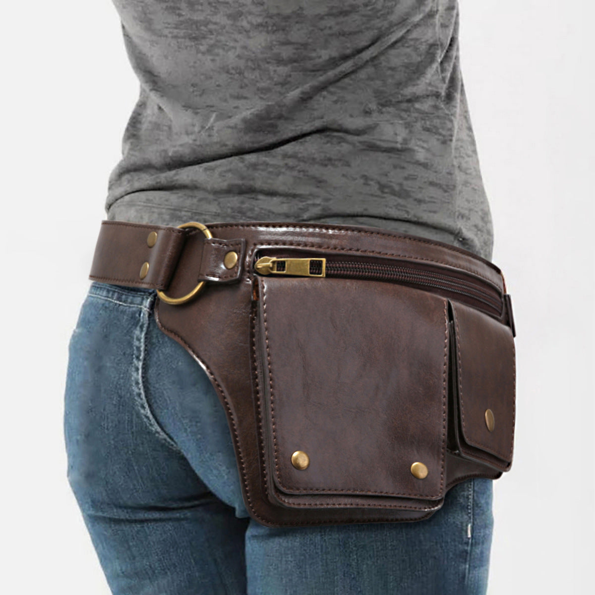 Dark coffee utility waist bag worn with jeans
