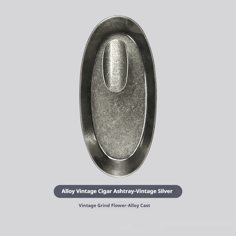 Antique silver-tone oval ashtray on a supplier information panel
