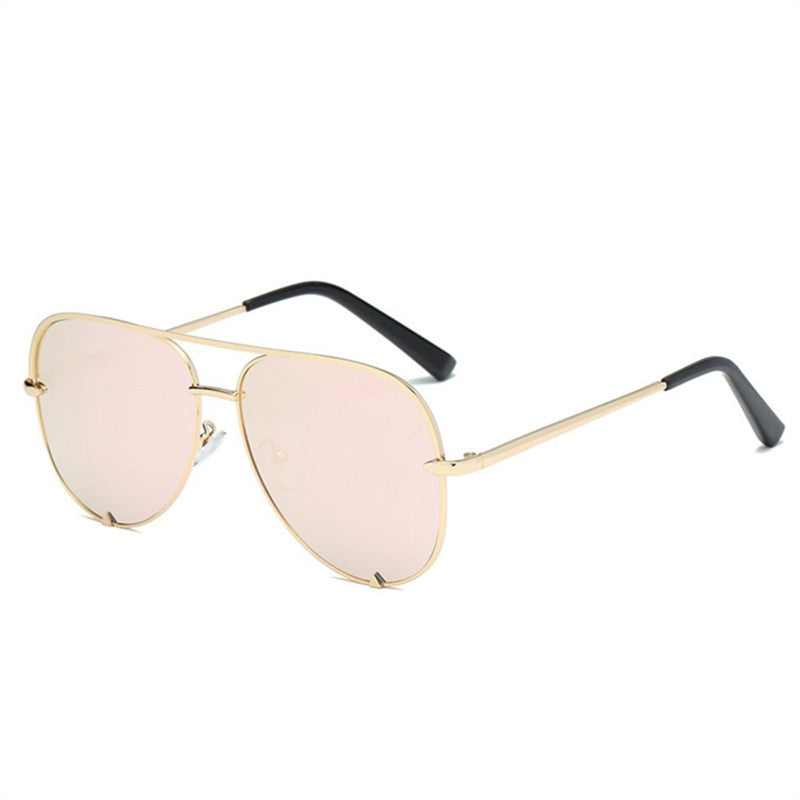 Oversized aviator glasses with gold-tone frame and pale pink lenses