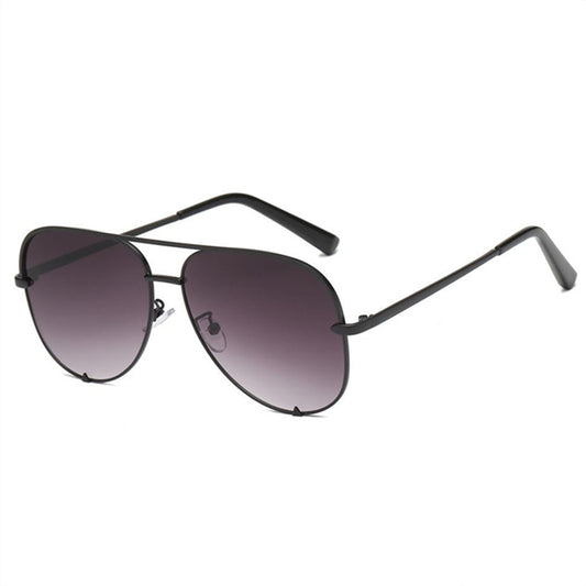 Oversized aviator glasses with black frame and dark gradient lenses