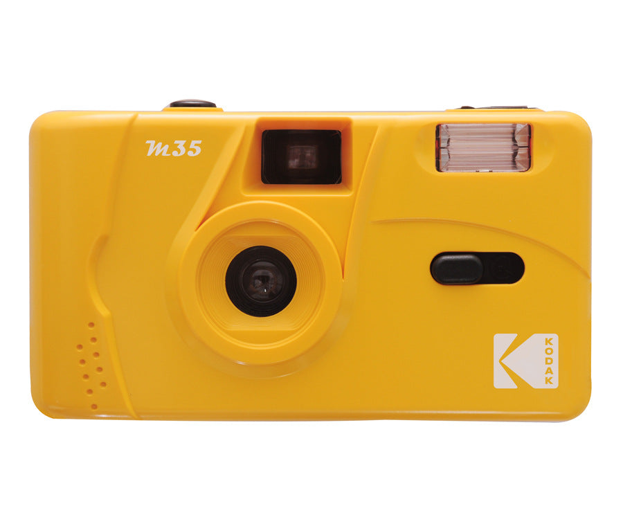 Yellow reusable 35mm film camera shown on white