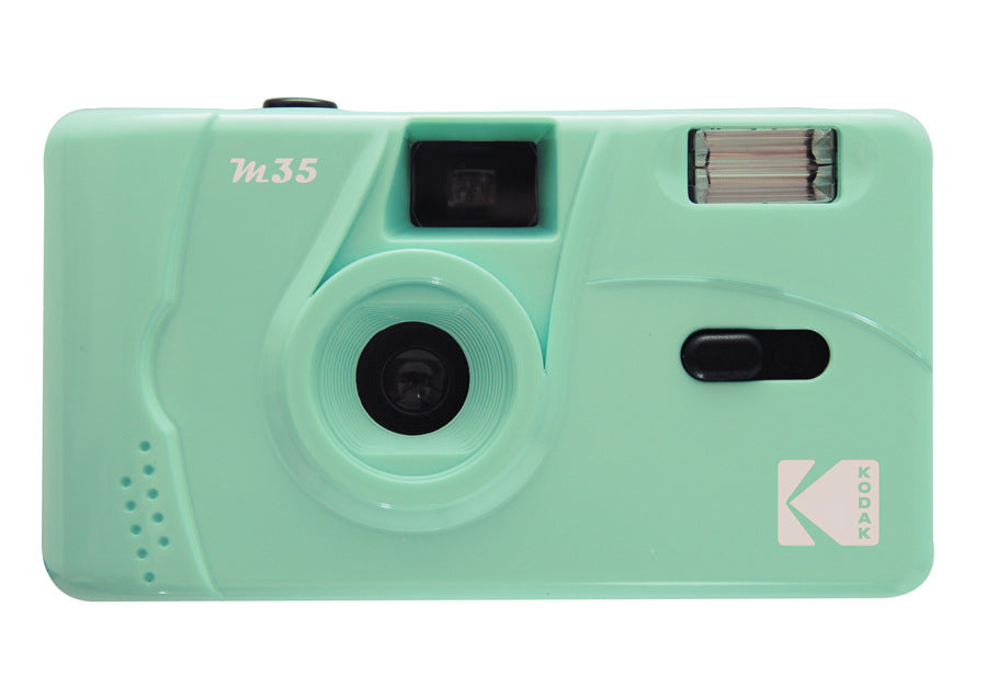 Green reusable 35mm film camera shown on white