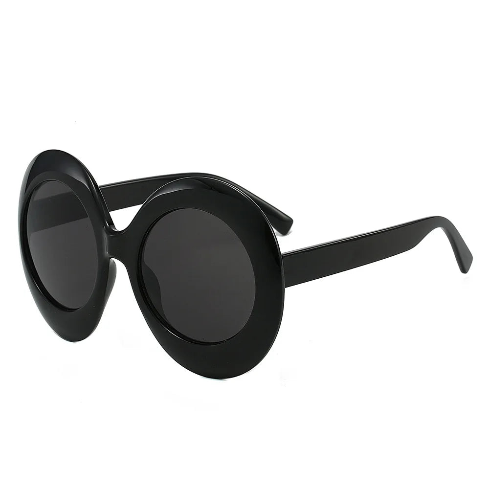 Oversized round black sunglasses with dark lenses