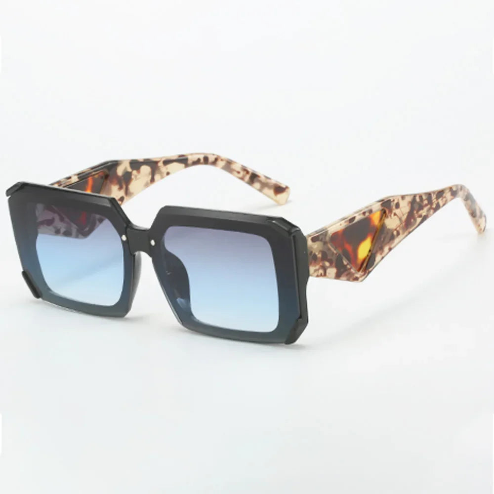 Black rectangular sunglasses with blue gradient lenses and patterned arms