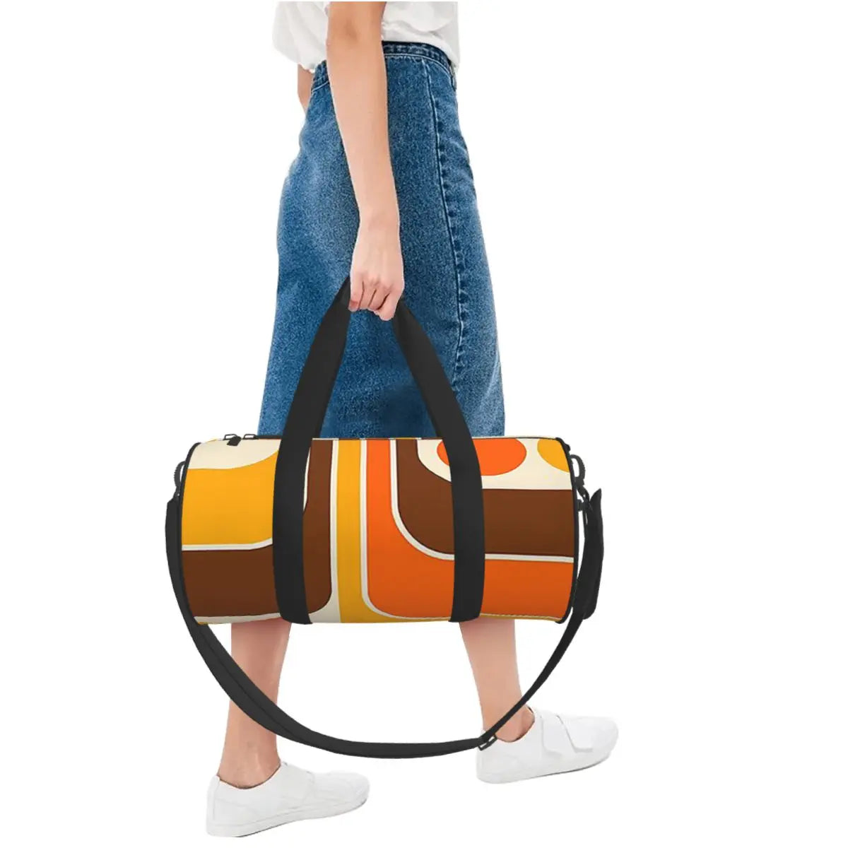 Person carrying the retro geometric duffel bag by its handles