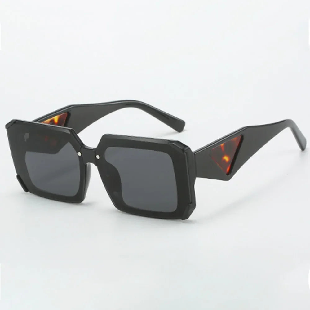 Black rectangular sunglasses with gray lenses and patterned arm accents