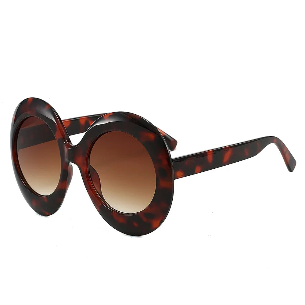 Round tortoiseshell sunglasses with brown lenses